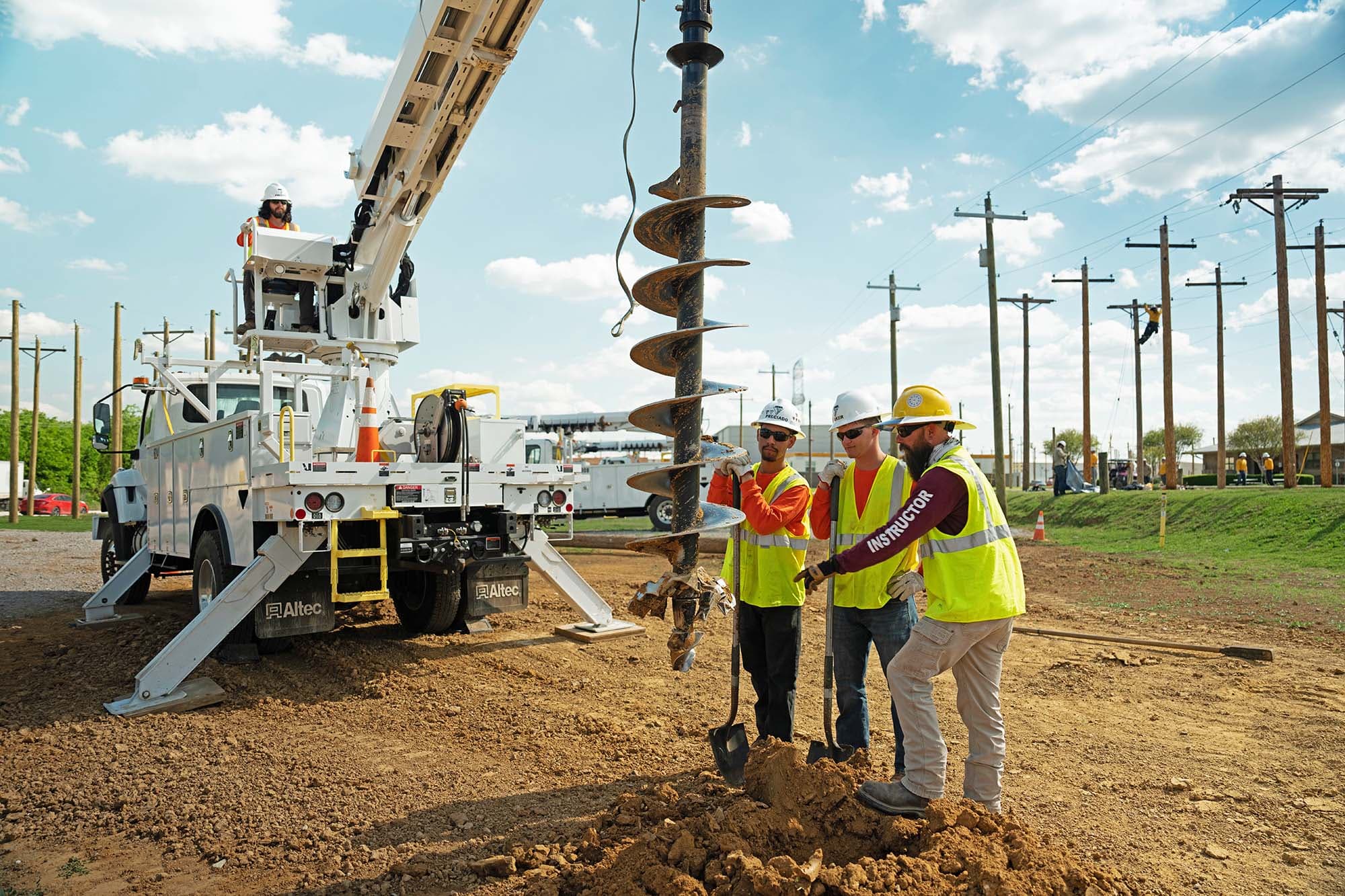 ELP students and instructor operating digger derrick truck in Texas.